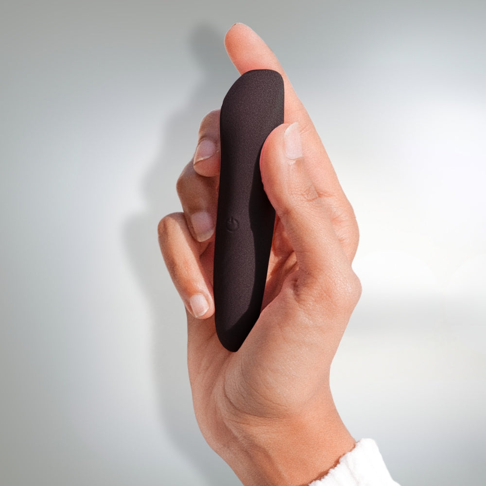 Featuring Dia Mini Noir, a sleek and premium black bullet massager, on a light grey background.
