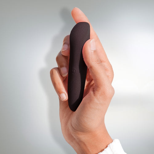 Featuring Dia Mini Noir, a sleek and premium black bullet massager, on a light grey background.
